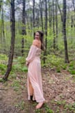 I saw this dress and was like ok it will be a stretch if I can pull it off and it looks good, but I sent it and bought it and I am so over the moon grateful. The color is even better in person in my opinion (it's like a baby pink) and it held my boobs perfectly (I was wearing a strapless bra). I felt literally like a fairy princess. I felt so confident and the buttons on the sleeves are gorgeous. The slit was not too high and it was the perfect length for me (and that is saying something because I am tall!!!). I would not pass up on this dress at all. I am so happy I went for it. - Bryn P.