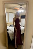 This dress is really high quality and heavier than I thought it would be!! I saw in other reviews that it ran a little large so I ordered an XS because I am between sizes XS-S and it fit perfectly. I'm around a size 2-4, but curvier, if that helps!! - Kelsey J.