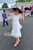I absolutely loved this dress for the Kentucky Derby! I ordered true to size, mainly to make sure my hips would fit and they did, but the bust/neckline/shoulders were a little loose. However, it was barely noticeable and I wouldn't have ordered a different size. The fabric does not stretch so take that into account. I received so many compliments on this dress! This was my first purchase from Lulus & I will definitely order again! - Jennifer W.