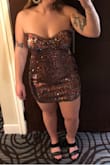 Love this dress! The cut outs on the side make a really cute accent. I am a little smaller chested so as the night went on the dress stretched out a little and it started to slip. I wish I saw more reviews based on sizing before buying so hopefully this one helps! Over all very cute and would highly recommend! - Alicia B.