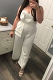 This is a super cute and comfortable romper. It has a lining underneath so you don't have to worry about it being see through. I am generally a md-lg and I ordered a lg and had to return it because it didn't zip up. I ultimately ended up getting an XL and it fit but was a little loose in the bust area but manageable. I wore this for my 1 year anniversary party that we had due to our Covid wedding. 

Cons: runs small, the top flips over, the zipper has issues going over a certain part 

Pros; cute, comfortable and got many many compliments on it. - Summer B.