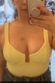 Love this bodysuit! I originally sized up to an XL based on the other reviews, but the top half was a little big and didn't support my chest at all. I exchanged for my regular size L and it's so flattering. My boobs feel lifted and supported, and the bodysuit is slimming on my torso. I have to say it was hard to pull on and for a second I thought it was going to be too small, but once it was on, it felt good. - Katie D.