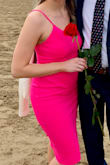 The quality of this dress was good and I received a lot of compliments on it which is great! It does have a fair amount of stretch to the material which made it comfortable to wear for ~12 hours. 

My only complaint is I think it is a couple inches too long for me because it was constantly riding up and bunching around my waist. - Lauren M.
