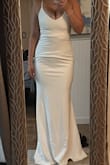 Love this dress so much. I'm usually a medium but the small fit me perfectly. The fabric is a little stretchy and material is soft and thicker. Not see through at all. The length is perfect with a high heel on me. - Safiye D.