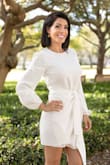 I have this dress in black and white! It's so comfortable and classy. Fits true to size and very nice material. Great for business or a nice night out! - Erica H.