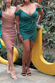 It's a revealing dress, but I received lots of compliments on it. Just don't wear it grandma's birthday party! The straps are adjustable, which is great because I could tighten them throughout the night. - Mel O.
