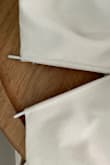 I'm so sad because this was really cute. I washed it once and the wire for the v poked through the fabric on both sides! Something I can't repair. - Liz W.