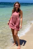 True to size but I bought this on the smaller side because I planned on using this as a beach coverup or a dress to wear with leggings. It was on the shorter side to wear as only as a dress but I usually run a small and this was an XS. Love the color and quality material! - Stephanie F.