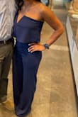 It's forgiving/stretchy and comfortable. It was VERY long. I wore 4" heels and it still dragged a bit. I liked that it was to the floor but maybe should've had it hemmed a smidge. - Dana H.