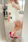 I bought this in white and pink as a rehearsal dinner/party outfit and I could not love it more. I ended up going with the white but both colors are beautiful. As a tall person with a ridiculously long torso, I struggle to find rompers that are long enough and with this being off-the-shoulder it works perfectly. The white isn't see-through at all and the shorts have enough room in them so they're not tight around your hips/bum. - Kristin H.