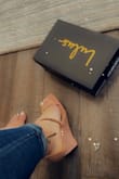Toe strap was too tight although the shoe is my size. Overall incredibly uncomfortable to wear. - Grace S.