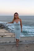 Such a cute, comfortable, and flattering dress! Even for a shorty, I'm 5'0 and didn't have to alter it. I'm almost 2 years postpartum and can't seem to get rid of the belly, but this dress hugs the curves nicely. Love the color too, it matched the ocean at the beach wedding I attended. - Lin J.