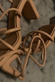 This is the cutest heel I've ever bought! It's definitely not true to size I'd definitely recommend to size down but it's cute asf!! - Abby A.