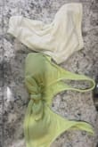 I washed the bikini top and bottoms in a lingerie bag on delicate then air dried them, they looked great. However once I was in chlorine the bottoms completely faded. I was in a lazy river on a tube so only the bottoms were submerged in chlorine otherwise the top would be completely white as well. It fit great and looks cute but I do not recommend getting this specific bathing suit in any color, it will fade. - Sam G.