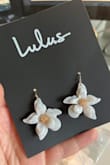 I don't know if I got a lemon but these earrings look different than the photos. The photos are beautiful, crisp and starch white with white flecks. The earrings I got look like gray marble with white-ish swirls? I cannot describe it so here's a photo. Still lovely and darling! Just not the style I'm looking for so I'll be returning them. - Allison T.