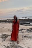 I wore this to a beach dinner and it was perfect. I was worried it would be a little hot, but the slit coupled with the crochet top kept the dress cool enough for me. It's very flattering and the top half very customizable size wise since you're able to tie the top. I felt very pretty in this dress and would definitely recommend. - Brittany C.