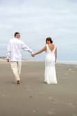 I can't express how happy I was to take a chance on this dress. It was a bit snug in the bust area and in an effort to not stress over trying to lose those last pesky pounds, my seamstress added a corset! Fabric was high quality and held up great even with a stroll in the ocean! - Aimee S.
