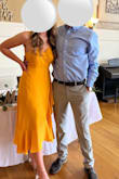 This dress was perfect for a spring wedding I attended. I liked the tie that goes around the waist, makes it easy to get a nice fit. The top straps laid kind of weird on me, but I might have had the dress tied too tightly. I got a lot of compliments while wearing this dress and it was very comfortable! - Emma S.