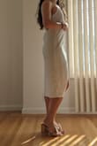 I wanted to love this dress but there were a couple issues I couldn't look past. The material is thinner than I expected and the hem doesn't lie flat. The elastic in the back also causes some bunching that I didn't find flattering. Unfortunately had to return. - Beatriz K.