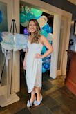 Wore this for my bridal shower! It was so comfortable and got so many compliments on it. I wore knee length nude shorts underneath, part of the skirt was see-through and knew I would be sitting in front of people during the shower. Usually wear Small or Medium, the small was too snug in the rib cage area, the Medium was great - Ariel G.