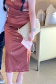 Took this to Cabo and it made my outfits. Love it. Was able to hold lots of things in there. - MeMe T.