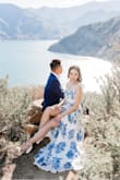 The dress fit me perfectly with no alterations. Since it's a wrap dress, it's very adjustable on the fit. Wore this for my engagement shoot and loved how it looked in the photos! - Kim T.