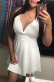 First I bought an XL because I have a wide back and I am tall. But I returned it and got a L and now it fits perfectly and the length is appropriate! I love it! This is my bachelorette dress! - Samantha M.