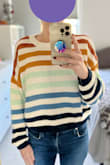 I love this sweater! It's really cute and comfy. I originally got a XS and S. Both fit, but I ended up going with the S since it is a little longer and I wanted to be able to wear it to work with a variety of different jeans instead of just high-waisted ones. It fits a little baggy, which is what I prefer, but the sleeves are a good length. I'd definitely recommend it! - Stephanie L.