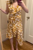 I ordered a medium but could have sized down to a small. I also wouldn't recommend this dress for those who have a short torso like myself. There was A LOT of extra fabric in the shoulders and it looked awkward when pulled down to fit. - Kathrine W.