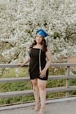 Bought this dress in black and white for my high school grad pics, but I went with black as the white was not very forgiving with Spanx lines. Nice material. - Jennifer V.
