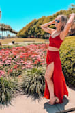 I ordered these in an x-small and they were still dragging on the ground even in wedges. I am 5'7" so it's not like I am super short. The set is very cute but I do wish the pants weren't so long. There's a very high slit up both legs so beware! - Amanda H.