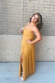 I bought this with one-day shipping hoping and praying it would work. It exceeded my expectations! I did have to tape my boobs to make them sit right. The back is very adjustable and lays better than the other 2 lace-up back dresses I ordered from Lulus. It is a little long, I was wearing heels so that made it doable. If I was wearing flats it definitely would've been dragging excessively. - Jordyn N.
