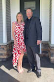 I received many compliments on this dress at the wedding I wore it to.  The slit where the dress folds over is a little high, but not ridiculous.  It felt great! - Marla K.
