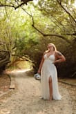 Loved this dress. I had so many compliments on it. I ordered an extra-large at first but it was way too big so I switched to a large. It was perfect. Not too tight and not too big but felt like a bride. - Kaitlin B.