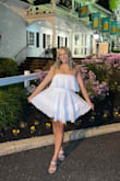 I am so in love with this dress! I bought it for my birthday and I couldn't be happier. It's a little snug around my chest, but that was to be expected. It's the perfect length, not see-through, and just so much fun! I would recommend this to anyone who loves white, strapless dresses. - Kimberly W.