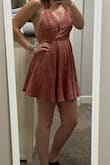 I order a medium and it fits great except in the chest. I had to use a lot of tape to keep the goods in and a safety pin to keep the top closed! The color was gorgeous though! - Shayna B.