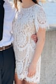 This dress was beautiful and perfect for my graduation. It fit well and was not see through. The only thing I had not expected was that the liner did not go above the chest, so you can see bra straps. I wore a nude bra and it was fine! - Alison P.