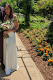 Bought this for my wedding elopement that took place in a botanical garden. The dress was PERFECT. And very slimming!! My weight is estimated as right now I fluctuate between 165-175, and I don't know my exact hip/wait dimensions so I put my normal "size 12 jeans" from American eagle size chart listing. I didn't need any alterations. - Gabrielle F.