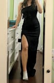 The dress is so flattering! It fit perfectly! With heels, it's not too long on me. I love that the material doesn't cling to my body like some dresses in this style. There is some give in the material, so it makes it comfortable and classy. - Alyssa S.