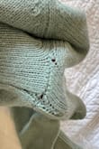 Runs slightly larger but it's probably just the cut. It's not flattering on a larger chest figure. Had quality issues with the seams under the arm. They were already coming apart! - Patricia T.