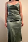 This dress is amazing! It is a lightweight fabric but not too thin. It highlights my curves and is easy to move in! - Maya H.