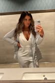 Fabric is very soft, not itchy at all. I would suggest purchasing a stick on bra vs wearing a strapless bra. True to size and for height reference, I'm 5'5" and wore 4" heels and the jumpsuit came to my ankles. Perfect fit. - Miranda F.