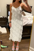 Typically I am somewhere between a size small and medium. After reading the reviews and people saying it runs large, I decided to order a size small& the small was pulling around my chest. I wish I would have ordered a medium and now it's sold out. So sad bc this is a super cute dress! - Emily R.