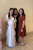 I used this dress for my baby shower! I got it hemmed because I'm so short, but it fit beautifully and I got endless compliments. It's a gorgeous dress. 

There is a part in the zipper that gets sticky (even with the dress off) but besides that, I loved this dress. - Heather S.