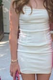 This dress is super cute and a great deal for the styling and weight of material. The white was not see-through with nude undergarments, which is one of the hardest things the get right when looking for a body-con white dress. I would size up one size as I am usually an XS in lulus and this was tight. I still loved though and am happy to have it in my closet! - Christian D.