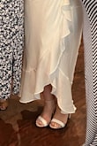 Having a wider foot, and thicker ankle has posed a problem when trying to get cute shoes with an ankle strap. I sized a 1/2 size up from a 7.5 to an 8 and these fit perfect. While it's not like walking on clouds I was able to stay in them for 6 hours before taking them off. Having these to wear for my bridal shower was the perfect shoe! While the photo seems like my toes were squished they weren't at all. - Andrena F.