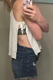 I really love this top as a cute, unique "hot young thing" summer top. I couldn't imagine wearing it without a bra since the knit of the shirt isn't fully tight/opaque, but you do you! Also, if I bend forward in this, my whole bust is definitely visible, but that's just the nature of the top. I've worn this with a bralette with tiny straps but I think it would look even cuter with a light-colored bandeau so the shoulder/neck area of the top could really shine and it wouldn't show through as much. - Kathryn R.