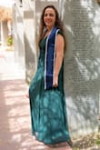 I am not short by any stretch of the imagination. I wore five inch heels with this dress, and I was still tripping on it. On top of that, the straps kept falling down. It gets two stars because I will keep it once I get it altered. - Alexandria S.