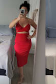 Beautiful material, thick but not heavy. Fits perfect. Straps are adjustable. Love the length. Makes me look taller. Very happy with this dress - Laura A.