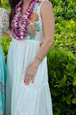 This dress is one of a kind. I'm 5'2" and got the XS, it is a little long but that's expected for maxi dresses on me. It's not see-through at all on the bottom. The sheer part on the top is what makes this dress and the embroidering is beautiful and perfectly placed to hide the nips! 10/10 love this dress. - Chloe L.